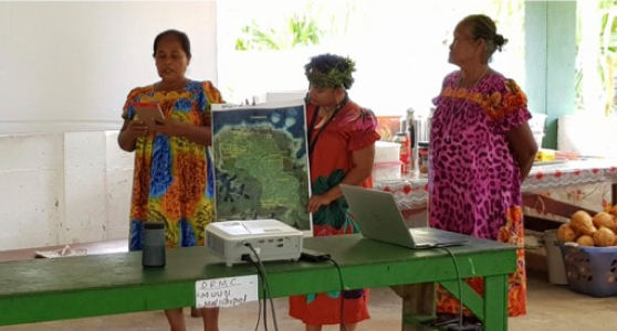 Women engaged in community participatory planning; Chuuj, FSM.